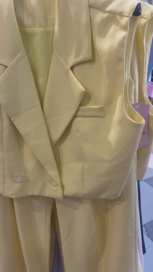 Traje chaqueta sin manga
